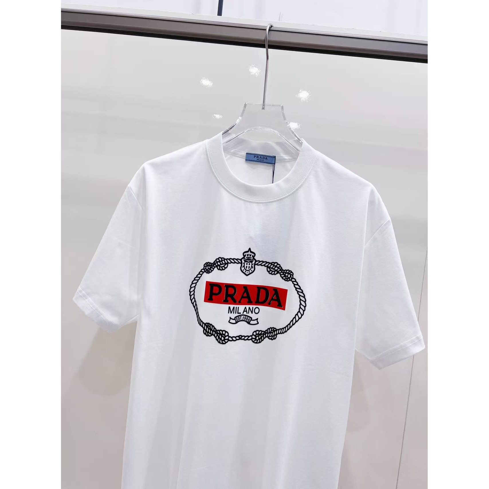 <p>PRADA 情侣休闲短袖T恤(白)</p>