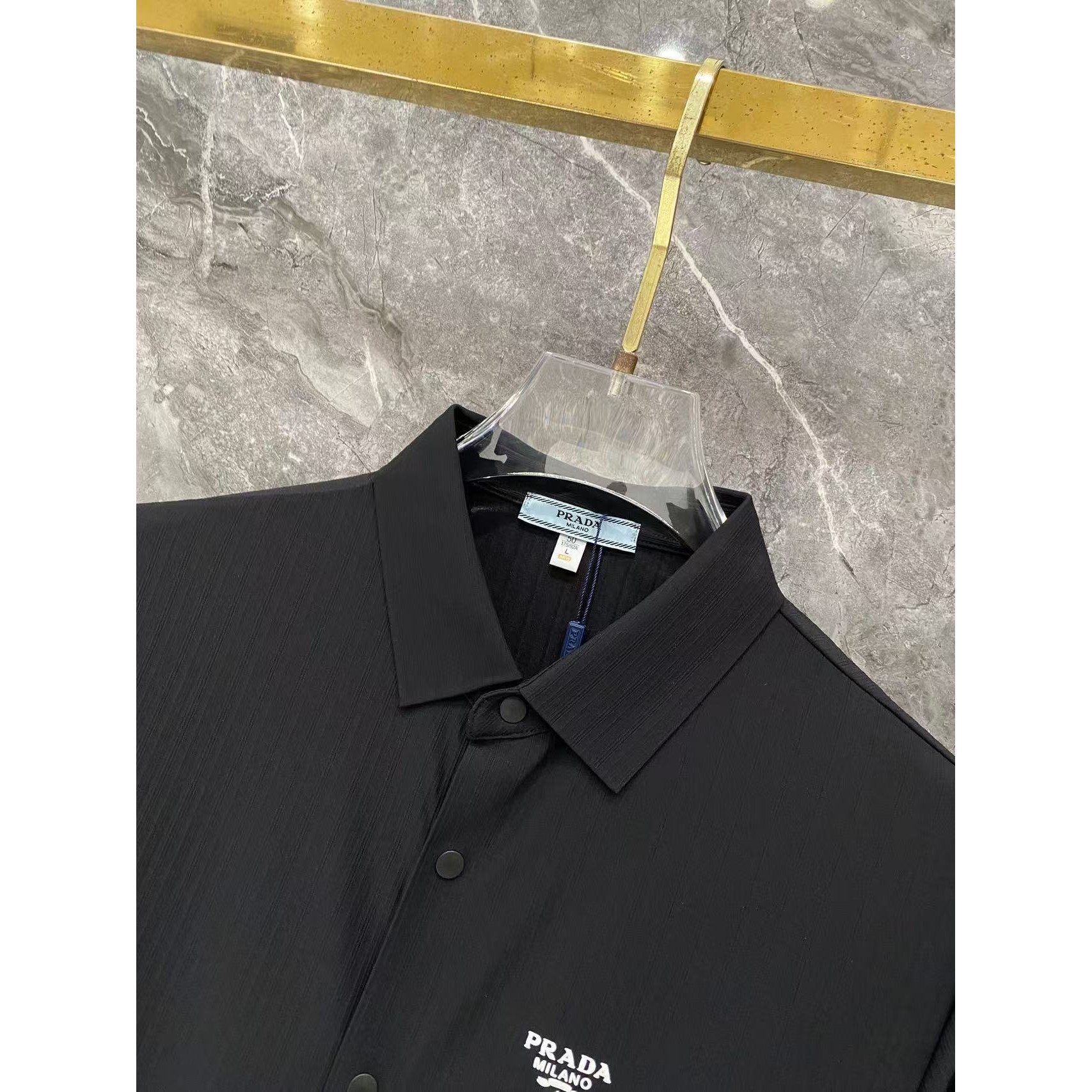 <p>Prada 秋冬长袖Polo(783003)</p>