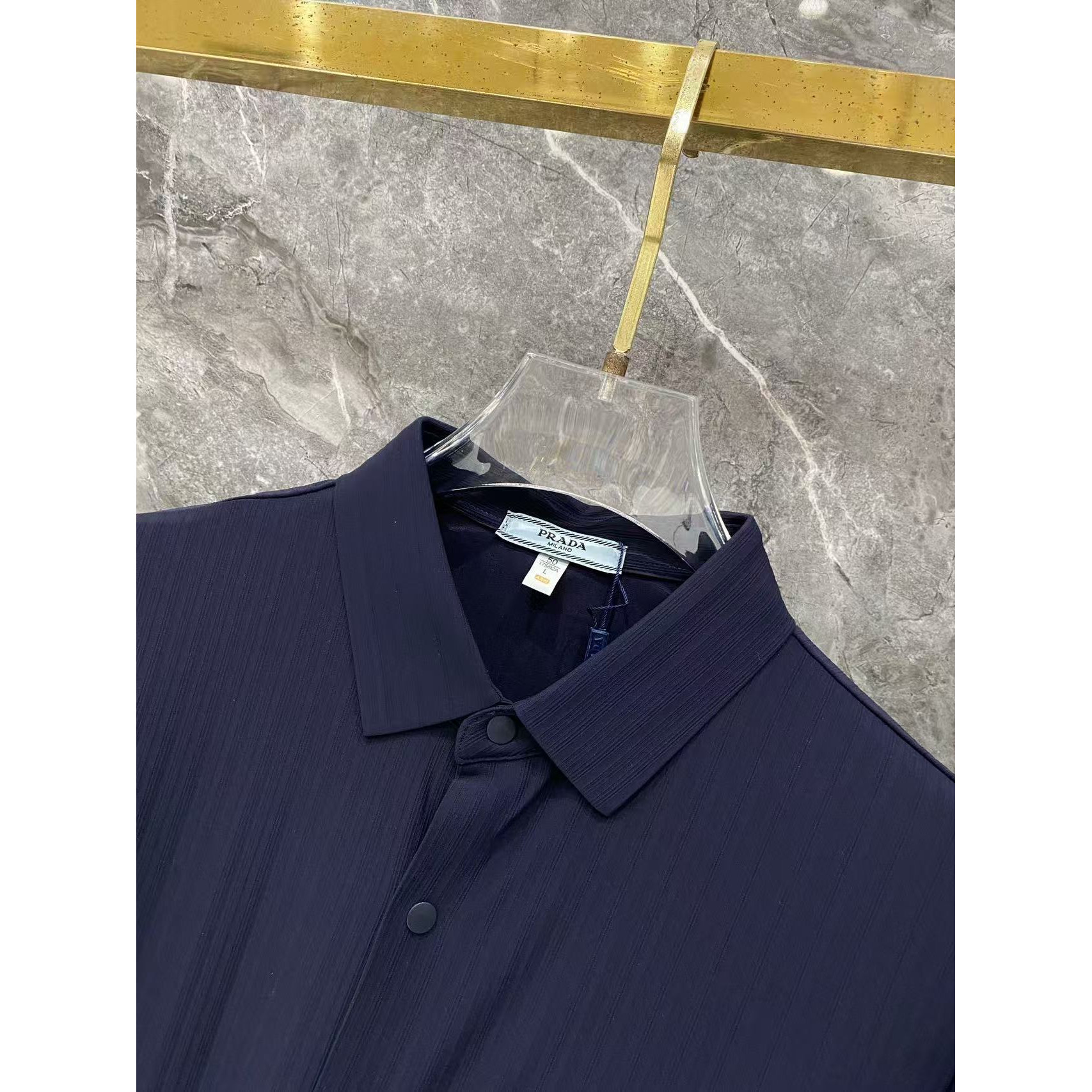 <p>Prada 秋冬长袖Polo(783011)</p>