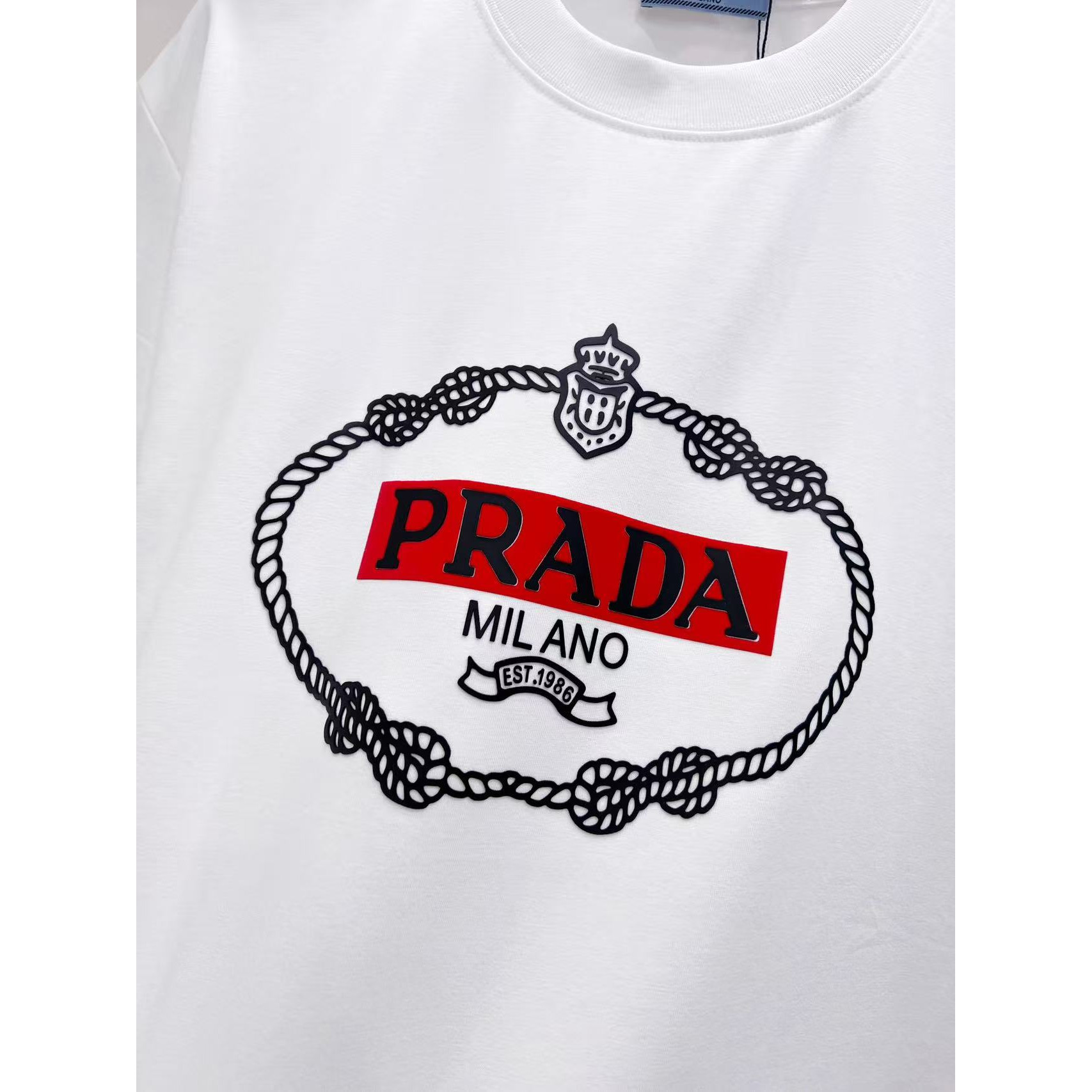 <p>PRADA 情侣休闲短袖T恤(白)</p>