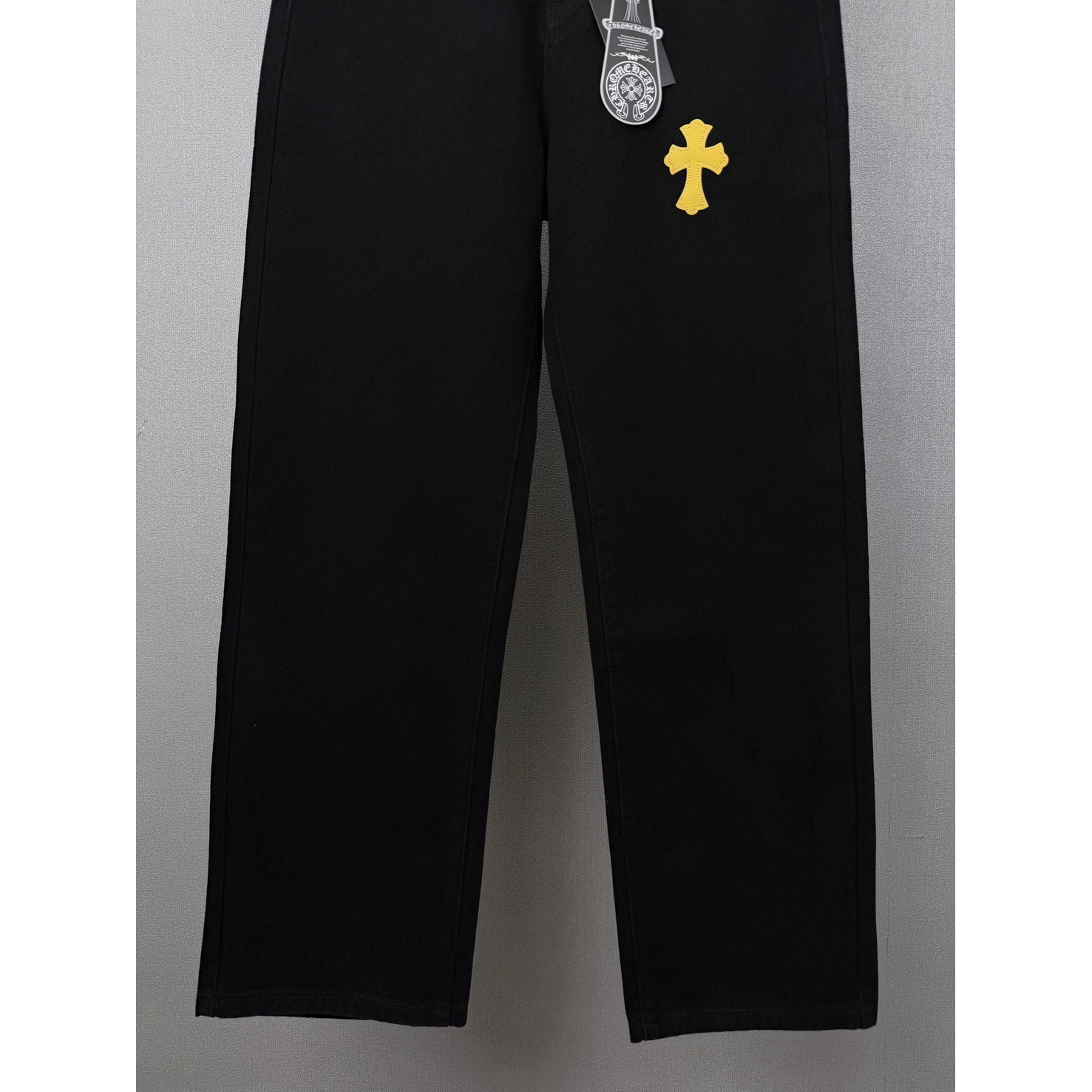 <p>CHROME HEARTS 黃十字架牛仔裤</p>