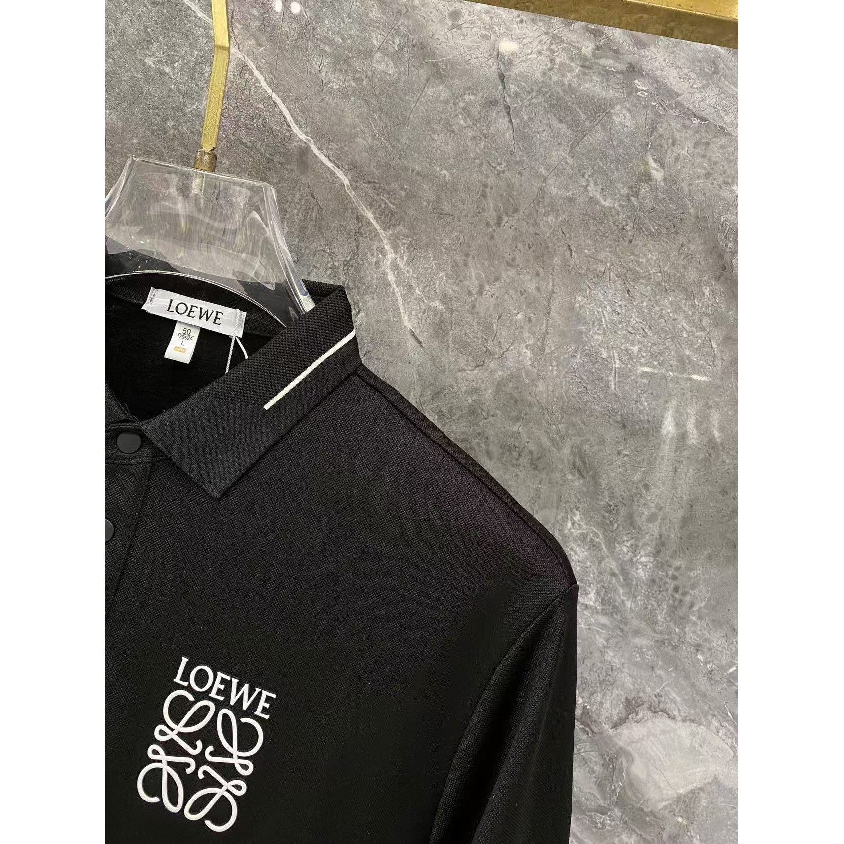 <p>&nbsp;LOEWE 秋冬长袖Polo(783021)</p>
