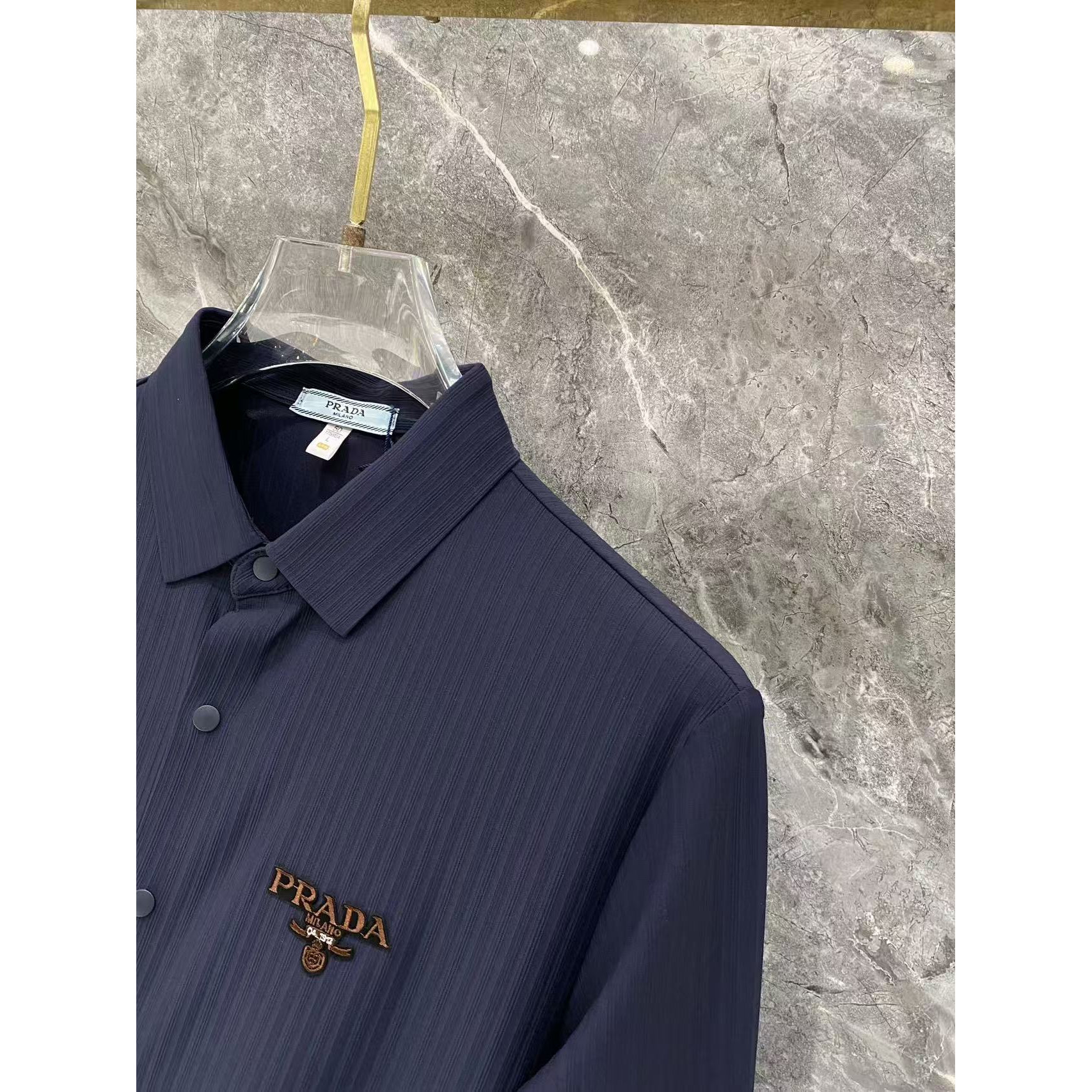 <p>Prada 秋冬长袖Polo(783011)</p>