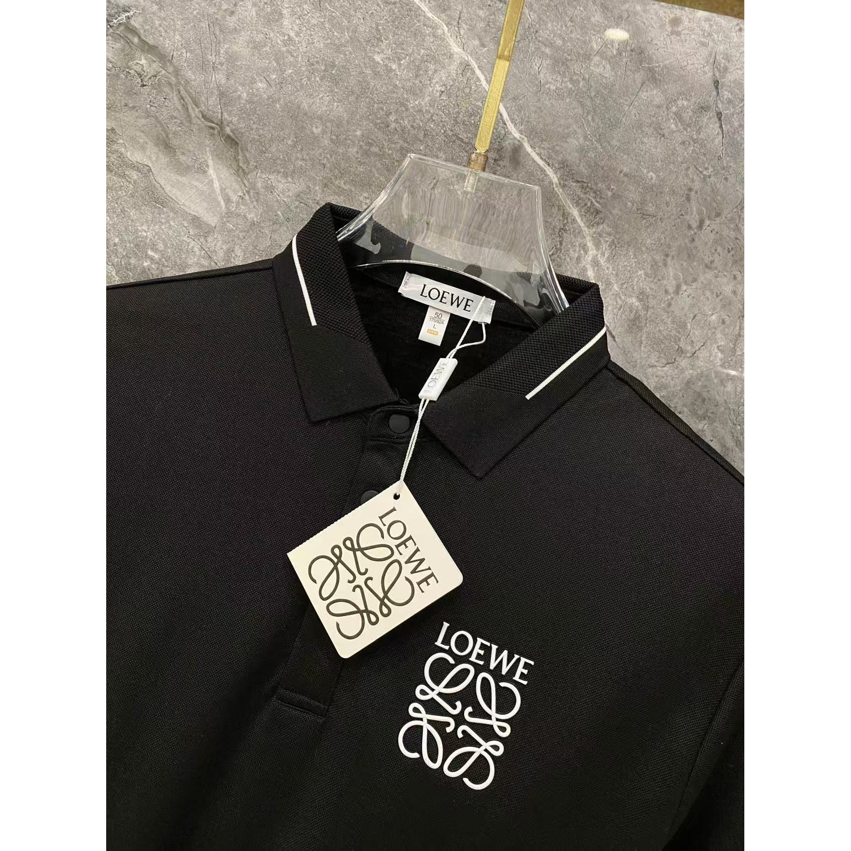 <p>&nbsp;LOEWE 秋冬长袖Polo(783021)</p>