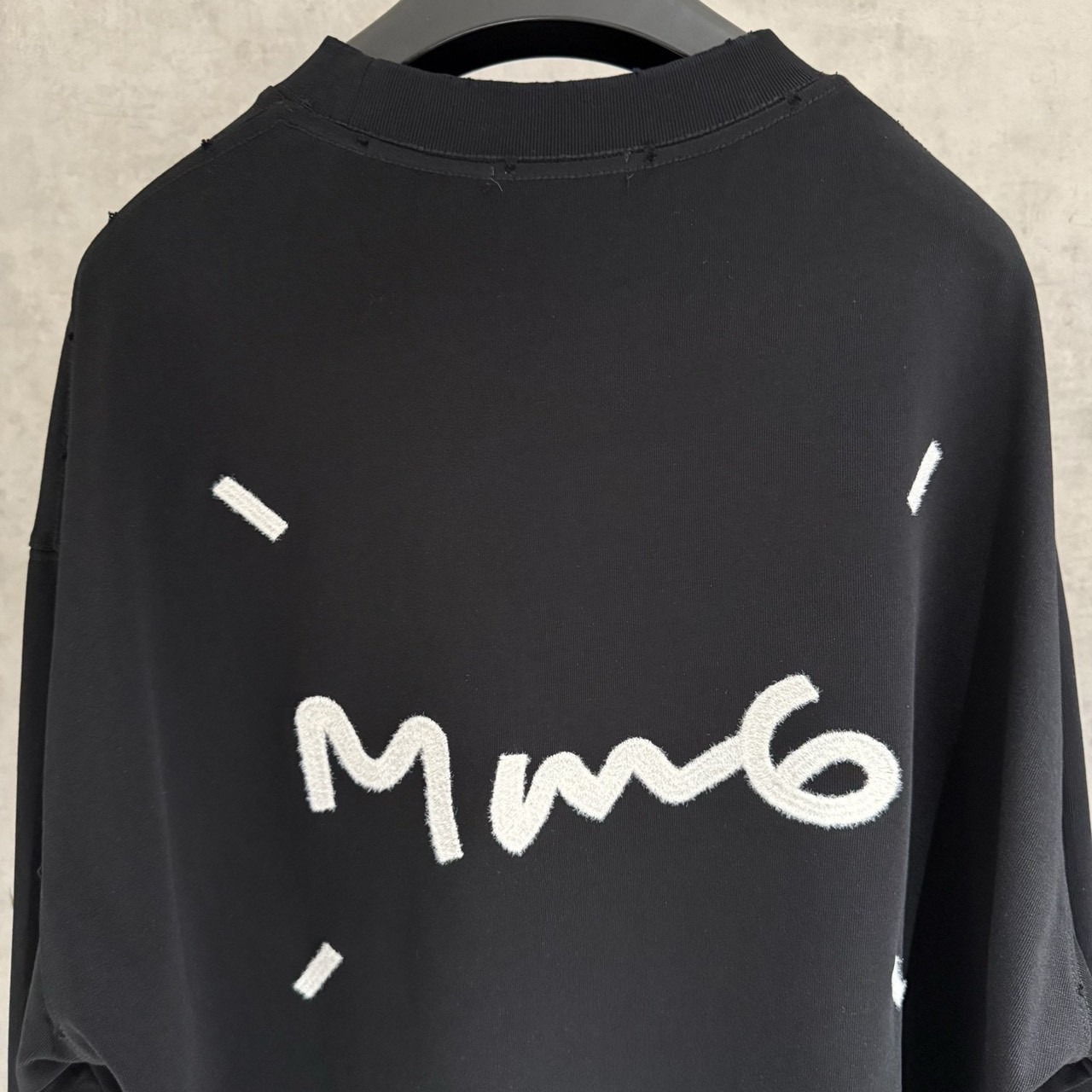 <p>Maison Margiela 长袖T恤(黑B04)</p>