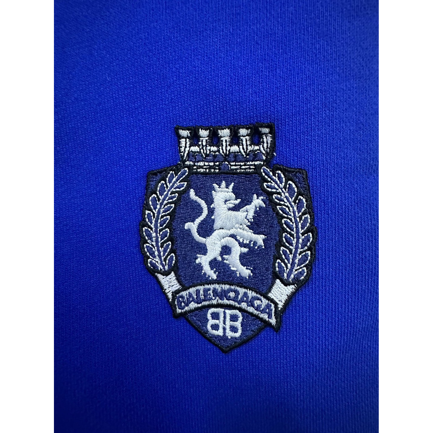 <p>Balenciaga Football系列七分休闲裤(藍)</p>