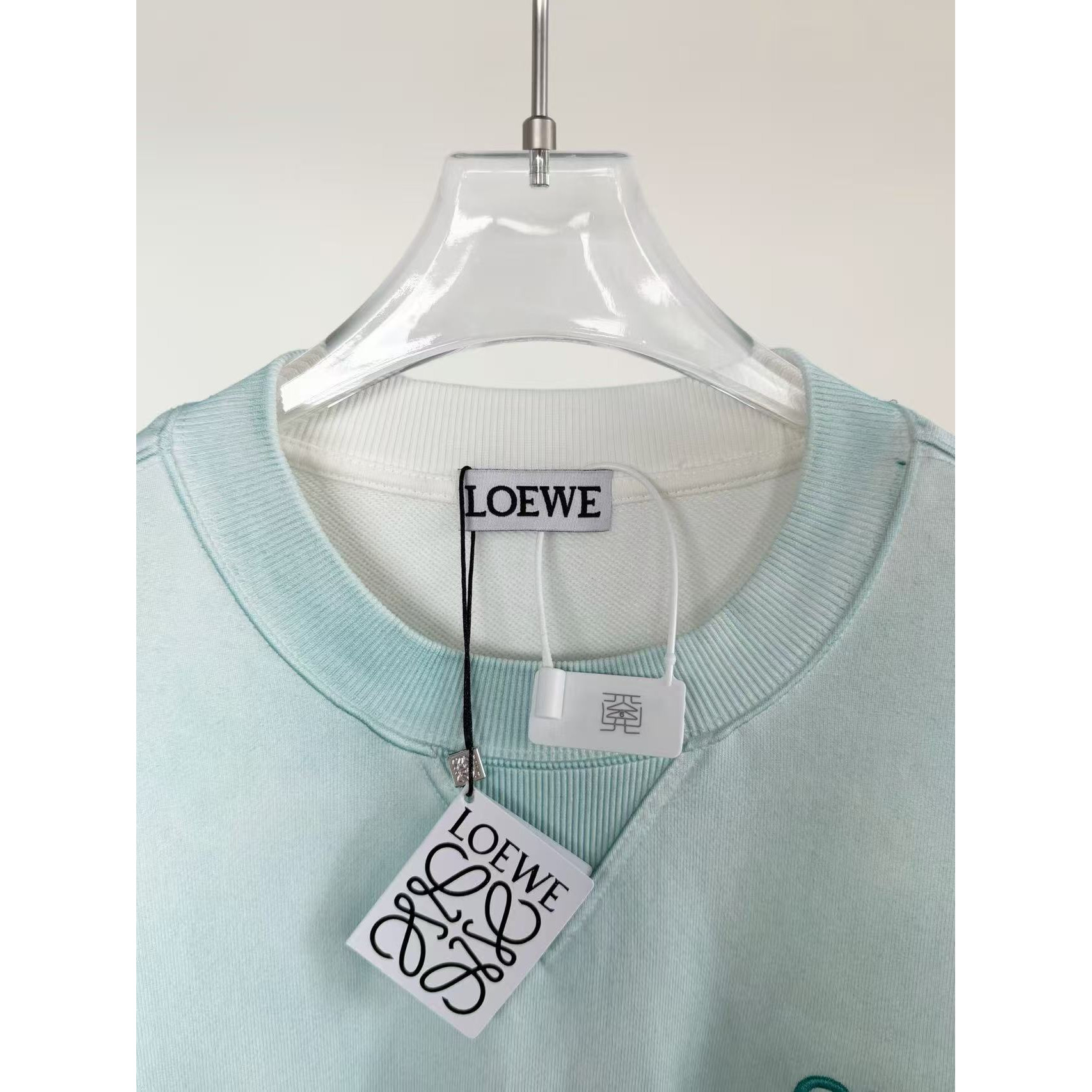 <p>Loewe 洗水圆领卫衣(藍色)</p>