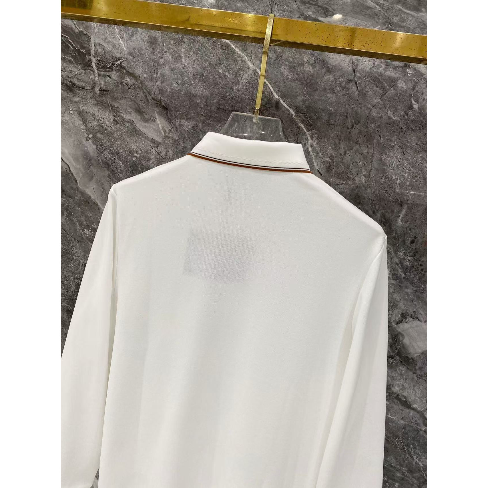 <p>Prada 秋冬长袖Polo(783010)</p>