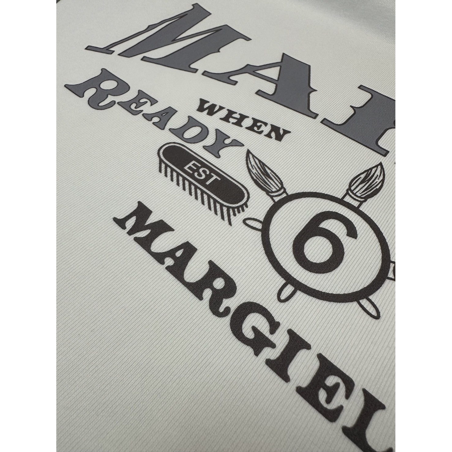 <p>Martin Mariela 正反颠倒复古logo印花短袖T恤(白)</p>