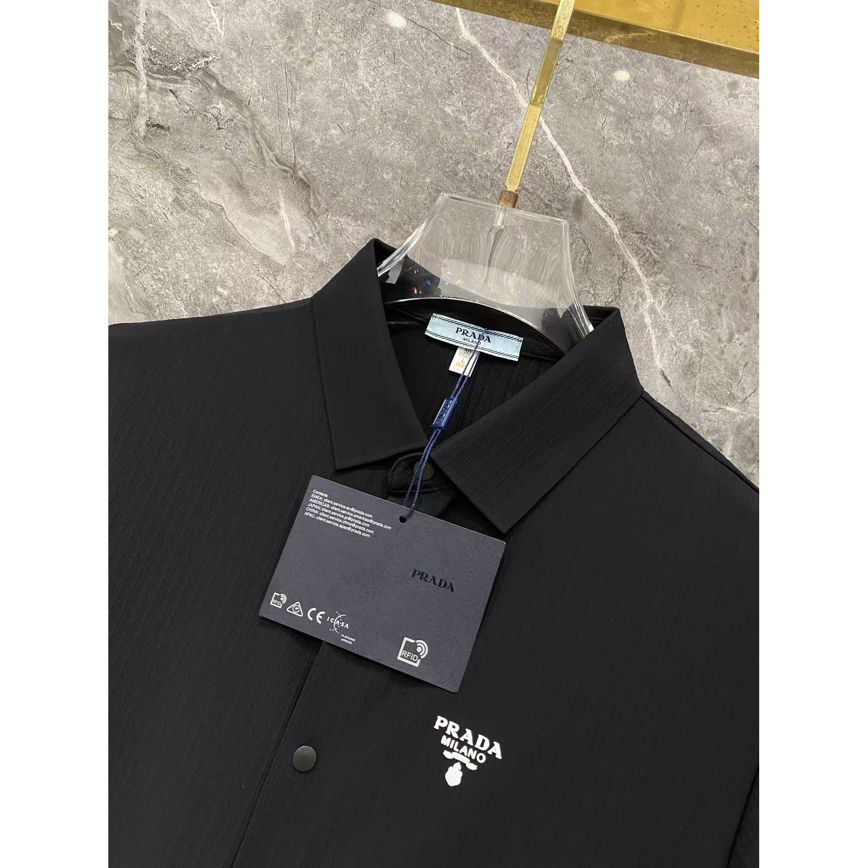 <p>Prada 秋冬长袖Polo(783003)</p>