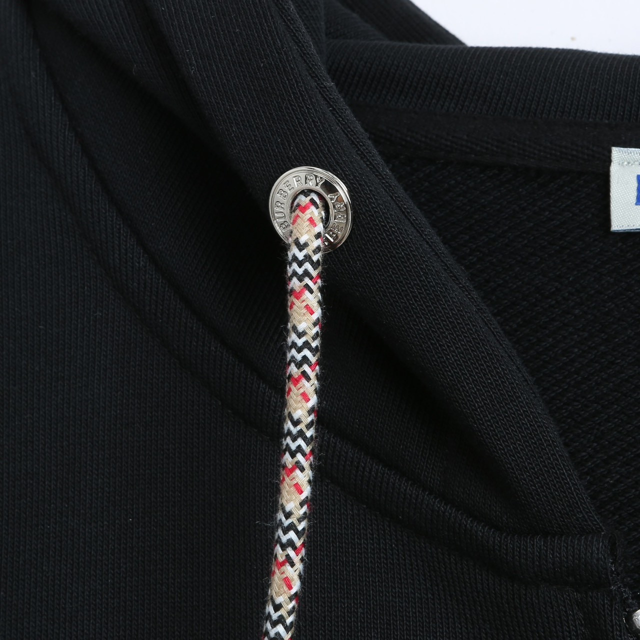 <p>Burberry 格子拼接连帽开衫卫衣(黑)</p>