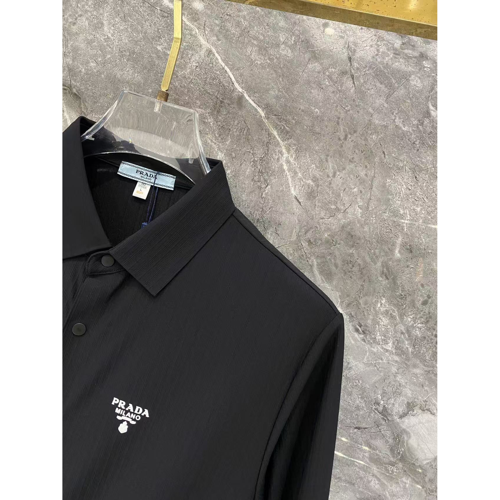 <p>Prada 秋冬长袖Polo(783003)</p>